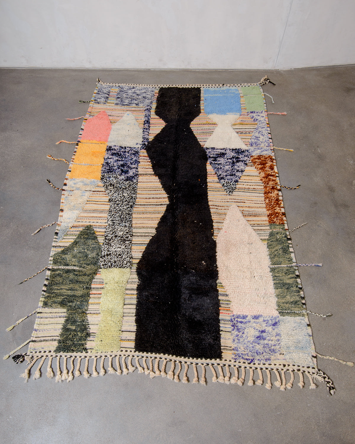 Modern, designer, handcrafted Berber rug from Morocco. Beniourain carpet with beautiful colours and patterns and fluffy wool texture.